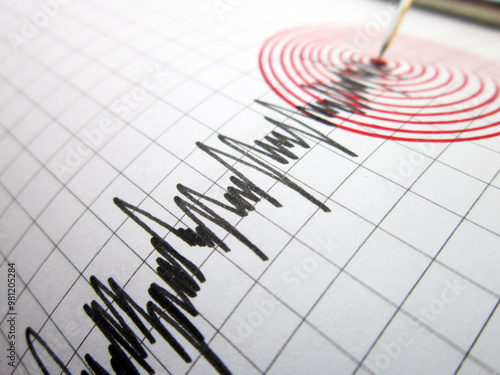 Seismograph and earthquake. A seismograph that records the seismic activity of an earthquake.