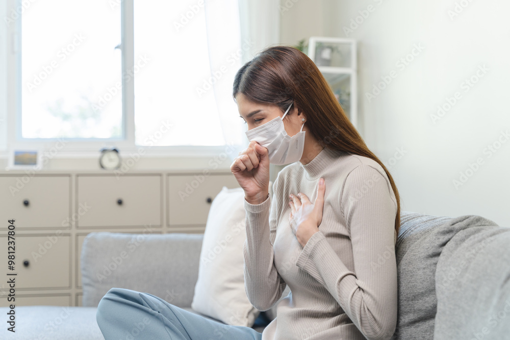 Female unhealthy Sickness, asian young woman, girl unwell and coughing, have cold, sore throat isolated white background suffering with symptom cough feeling bad. Healthcare of Coronavirus, covid-19. Female unhealthy Sickness, asian young woman, girl unwell and coughing, have cold, sore throat isolated white background suffering with symptom cough feeling bad. Healthcare of Coronavirus, covid-19.
