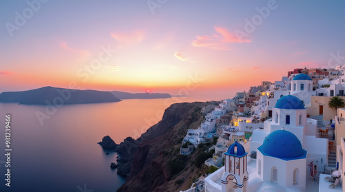 Breathtaking Aerial Views of Santorini at Sunset - Iconic White Buildings and Blue Domes Overlooking the Caldera