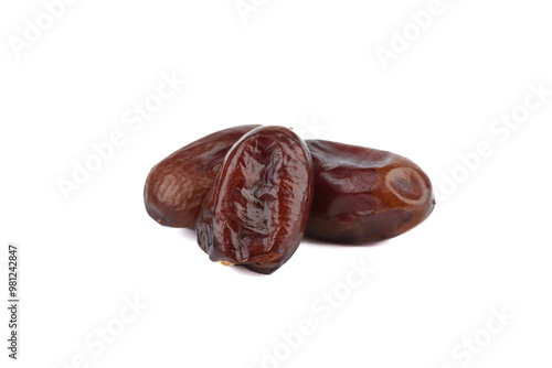 Three dried date fruits isolated on white background.