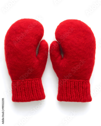 A pair of thick woolen mittens in a bright red color