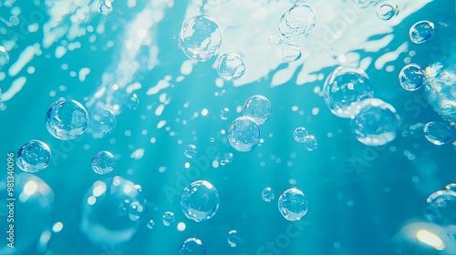 Wallpaper Mural a multitude of air bubbles rising through clear blue water Torontodigital.ca