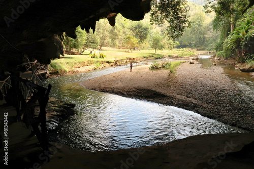 Walking into the big opening that forms the entrance into the Nam Lod, Tham Lot Cave, Mae Hong son Loop, close to Pai, Thailand photo