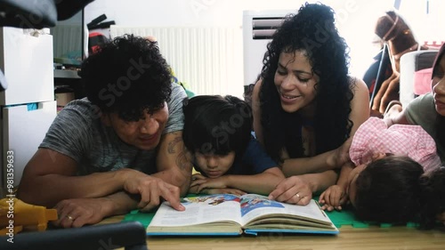 Cozy family moment featuring parents reading a beloved bedtime story to their young children