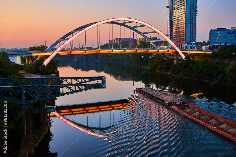 Fototapeta premium Korean Veterans Bridge at Blue Hour with Barge Motion in Nashville
