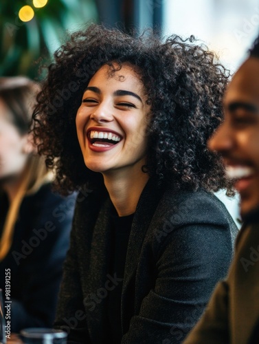 Happy Black Woman Laughing in Social Gathering