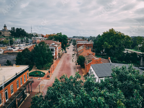 Old town brick road with brown buildings