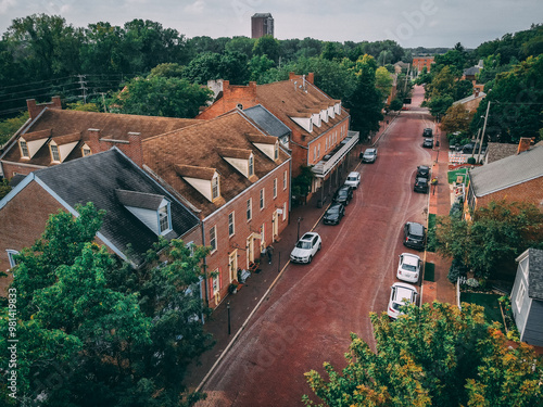 defaultOld town brick road with brown buildings