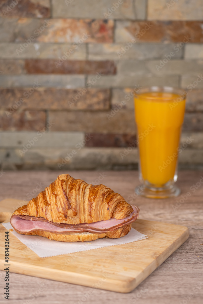 Ham croissant and orange juice
