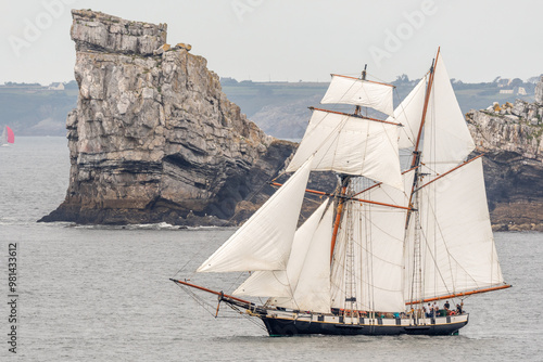 Large traditional sailing boat in a bay on the Atlantic Ocean during the Camaret sur mer sail festival. photo