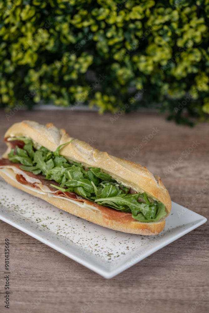 sandwich with serrano or prosciutto ham and arugula