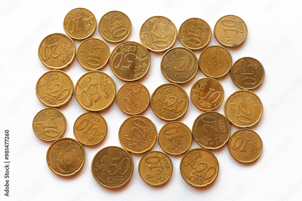 a handful of golden euro coins that look like gold a handful of golden euro coins that look like gold
