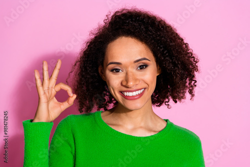 Photo of charming cheerful nice cute woman wear green stylish clothes okey sign isolated on pink color background