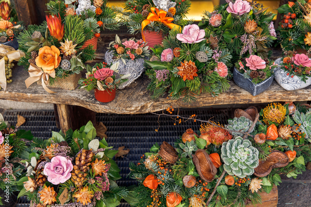 Fototapeta premium Colorful flower arrangements, handmade floral decorations, vibrant table centerpieces for festive occasions, floral creativity concept