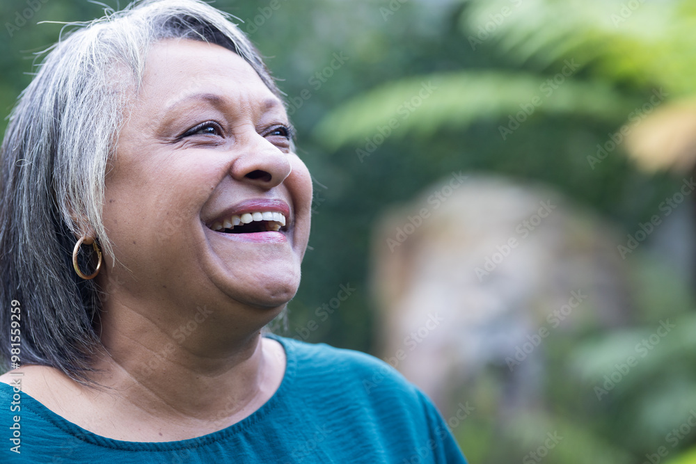 In garden, Smiling senior woman enjoying outdoor hangout, feeling happy and relaxed, copy space In garden, Smiling senior woman enjoying outdoor hangout, feeling happy and relaxed, copy space