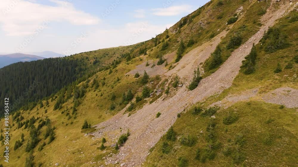 Aerial view of the Carpathian Mountains in Romania. Transalpina. Drone video of one of the most iconic Parang mountains. Top cinematic aerial view Aerial view of the Carpathian Mountains in Romania. Transalpina. Drone video of one of the most iconic Parang mountains. Top cinematic aerial view