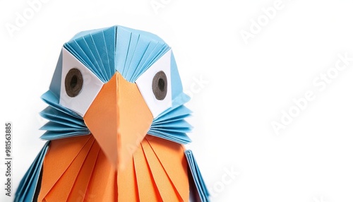 Animal concept paper origami of a common, Eurasian or river kingfisher - Alcedo ispida - has blue green upper parts, orange underparts and a long bill - isolated on white background with copy space photo