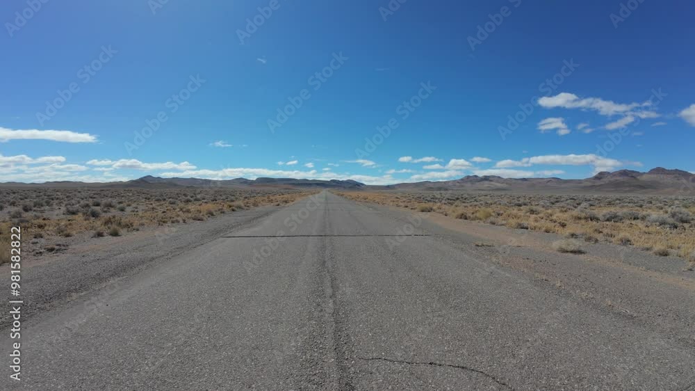 Moving on an empty stretch of road in Nevada Moving on an empty stretch of road in Nevada