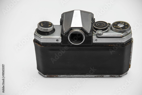 Poorly treated photo camera destroyed by time damaged broken