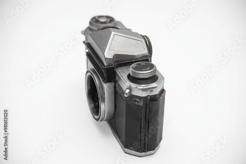 Poorly treated photo camera destroyed by time damaged broken