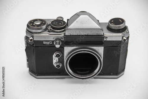 Poorly treated photo camera destroyed by time damaged broken