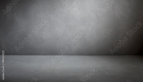 Textured gray photography studio background with depth of field for a dramatic effect