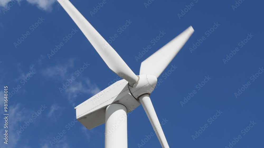 High power Wind turbine with clear sky behind it High power Wind turbine with clear sky behind it