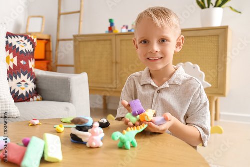 Cute little boy sculpting f...