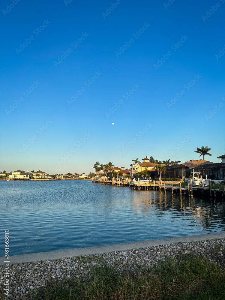 Fototapeta premium Moon Over Florida Houses At Canal