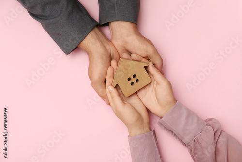 Couple with house figure on...