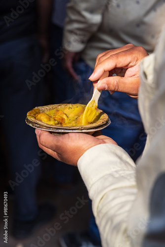 Eating street food at an outdoor market in Pushkar.