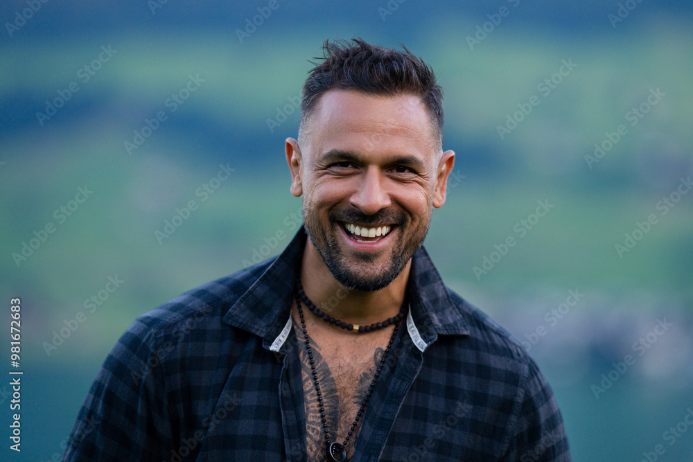 Portrait of the happy handsome man outdoor. A Hipster guy model headshot. Male face. Young handsome man. Confident male model. Hispanic Man looking proud. Closeup face of attractive man. Elegant guy.
