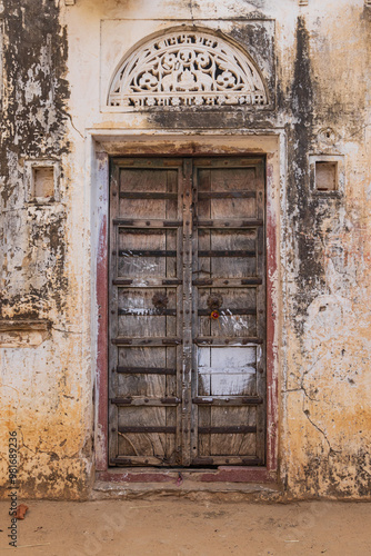 Old wooden door on a building in Rajasthan. photo