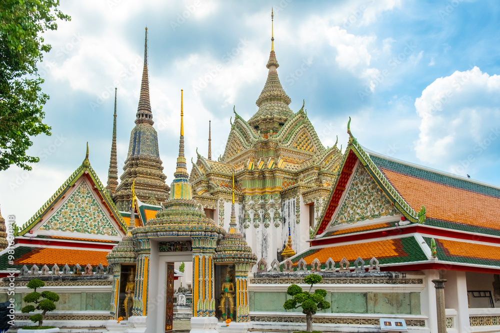 Naklejka premium Wat Pho Temple Complex in Bangkok city with traditional Thai Buddhist architecture in Thailand, Asia. Phra Mondop of Temple of the Reclining Buddha. Popular tourist landmark