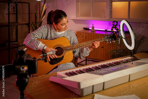 Female music blogger playin...
