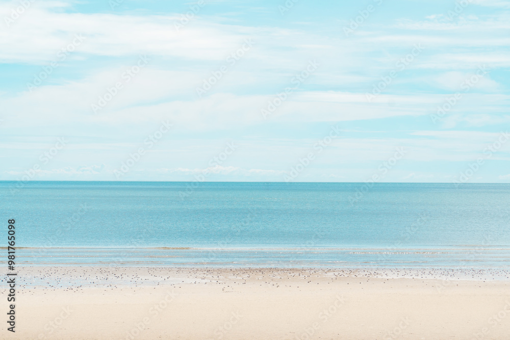 Ocean wave beach on summer with blue sky Ocean wave beach on summer with blue sky