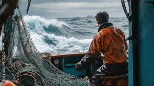 A fisherman navigates rough seas, surrounded by waves and fishing gear. photo