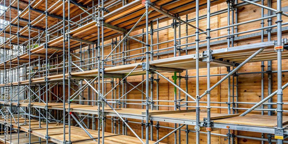 A detailed description of a scaffolding structure with wooden planks and metal poles, construction, building, safety A detailed description of a scaffolding structure with wooden planks and metal poles, construction, building, safety