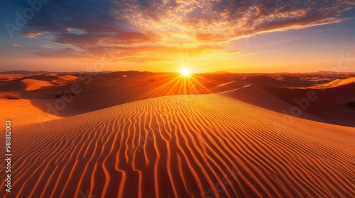 Sunset Over Wavy Sand Dunes in the Desert