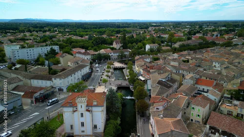Drone shot over L'Isle-sur-la-Sorgue France following the Sorgue river Drone shot over L'Isle-sur-la-Sorgue France following the Sorgue river