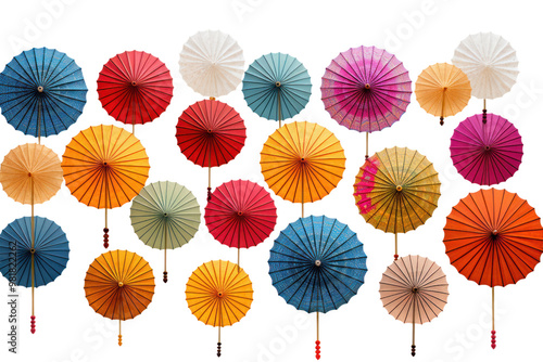 A colorful array of rain umbrellas in various sizes and patterns arranged in a fan shape, highlighting diversity in design isolated on white background