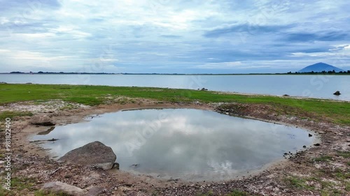 Landscape of Dau Tieng lake in cloudy day, a biggest freshwater source with irrigation dam at upstream  Saigon river at Tay Ninh, Binh Duong, Binh Phuoc photo