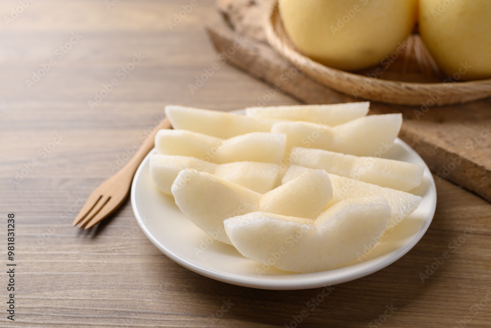 Asian pear fruit on plate ready to eating, Sweet and juicy fruit Asian pear fruit on plate ready to eating, Sweet and juicy fruit