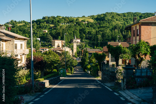 Sentiero degli Dei. Village and wind wind turbine along the Path of the Gods. San Benedetto val di Sambro, Bologna Province, Emilia Romagna, Italy.