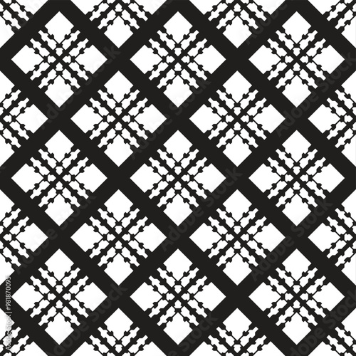 A geometric pattern featuring black and white diamond shapes with intricate designs, suitable for textile or wallpaper design.