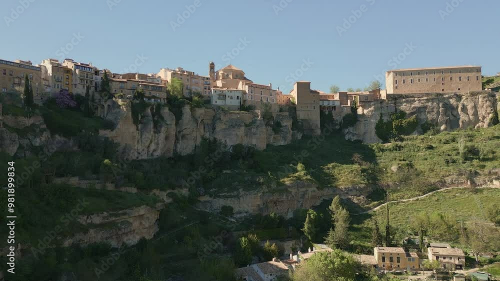 Hanging houses of Cuenca. Aerial view of medieval houses next to a cliff. Casas colgadas. Cuenca. Spain. Hanging houses of Cuenca. Aerial view of medieval houses next to a cliff. Casas colgadas. Cuenca. Spain.