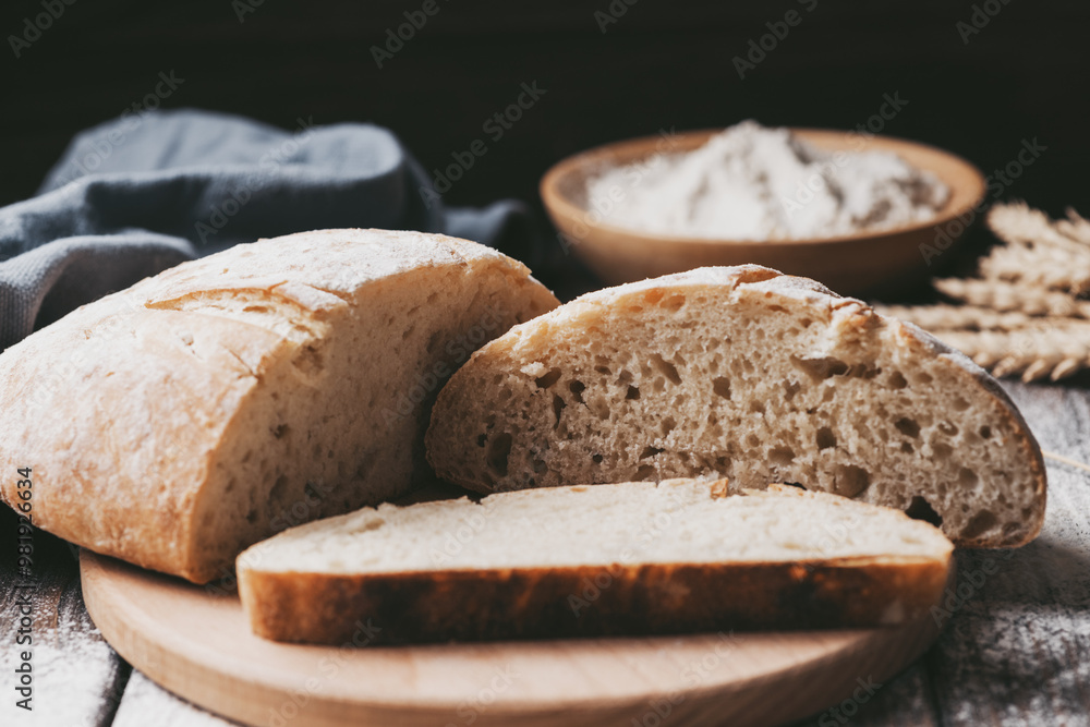 Freshly baked loaf of homemade bread on the grill Freshly baked loaf of homemade bread on the grill