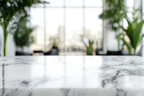 White marble table top with blurred background of green plants and city view.