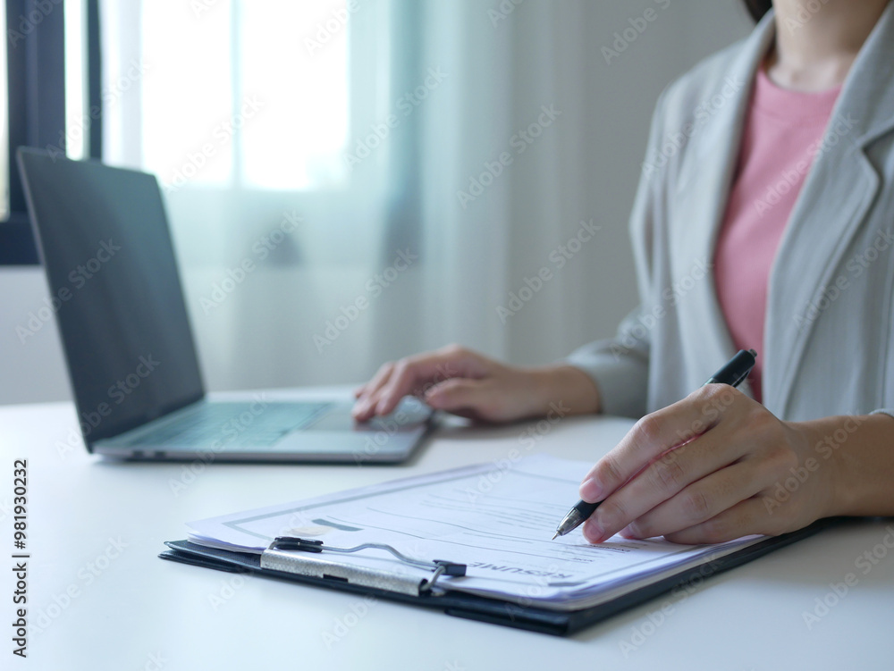Business woman employer holds resume and talks with job applicant for job interview about her career and personal history in company, recruitment concept Business woman employer holds resume and talks with job applicant for job interview about her career and personal history in company, recruitment concept