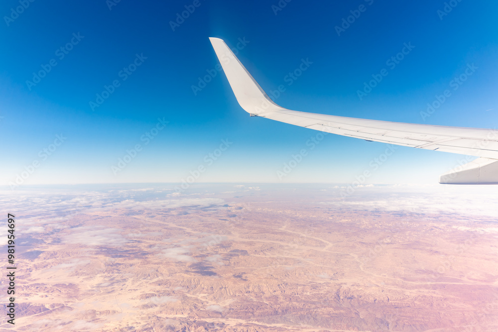 Aerial view on arabian desert and Red sea mountains from airplane Aerial view on arabian desert and Red sea mountains from airplane